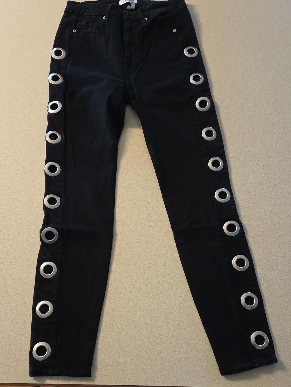 Good American Black Skinny Jeans with Silver Grommets